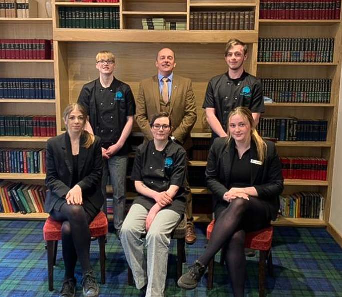 Andrew Mackay, owner of The Caithness Collection with modern apprentices at the Norseman Hotel Andrew Mackay, owner of The Caithness Collection with modern apprentices at the Norseman Hotel