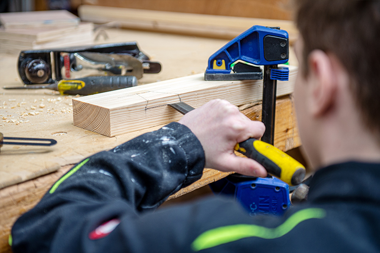 student working in the workshop student working in the workshop