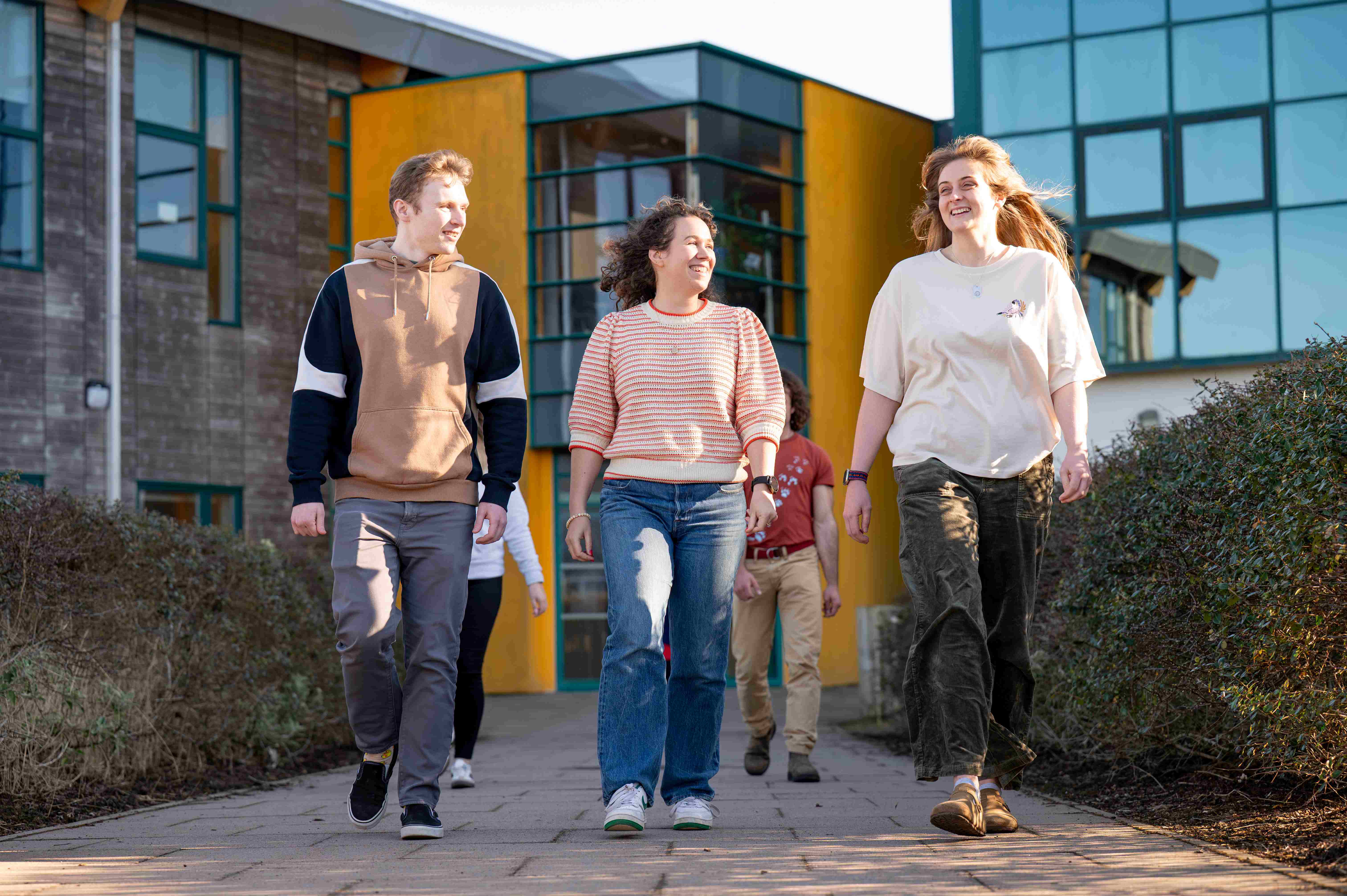 group of students walking out of Thurso campus building